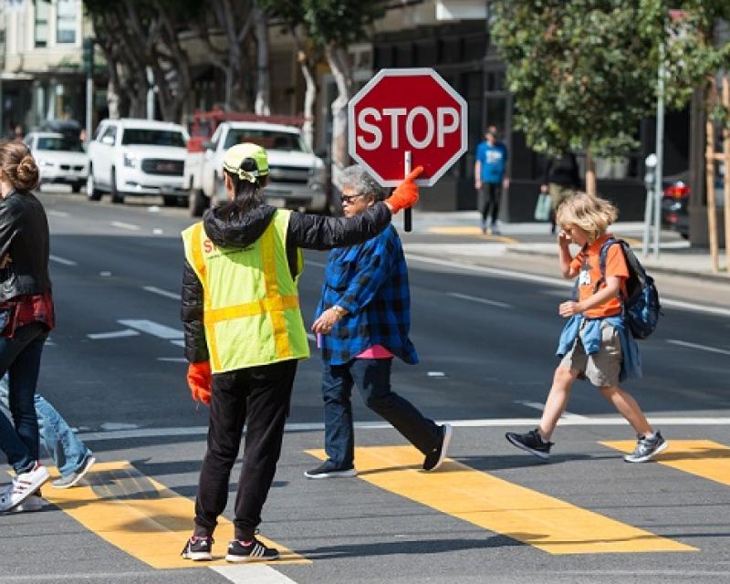 Kids crossing the street.