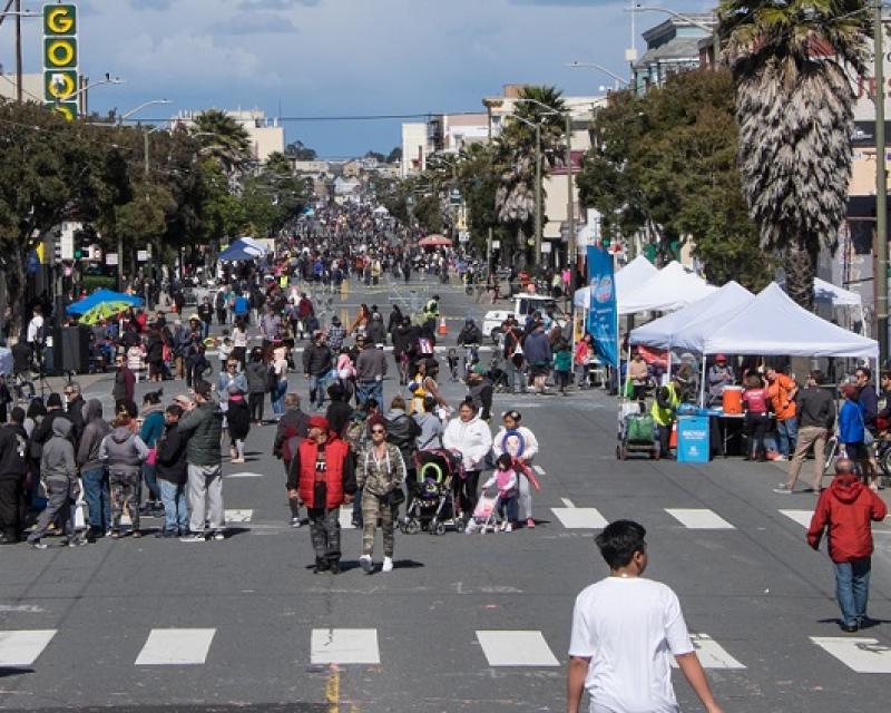 People having fun at Sunday Streets in the Mission.