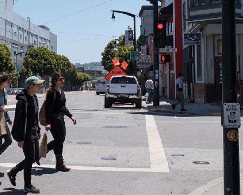 People crossing the street in Dogpatch.