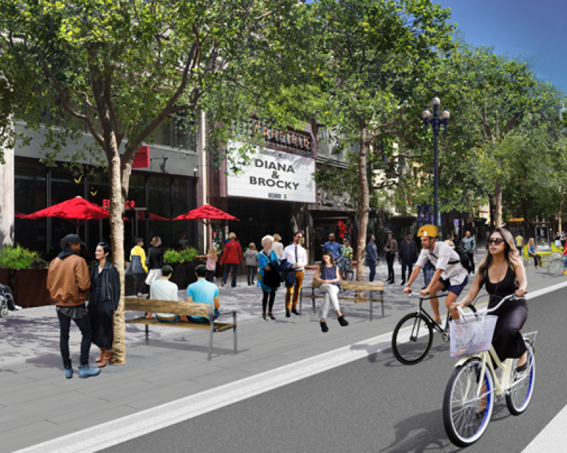 Rendu incluant la piste cyclable au niveau du trottoir de Better Market Street, de nouveaux arbres et des éléments de paysage de rue améliorés.