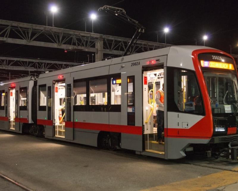 Photo of muni train at night