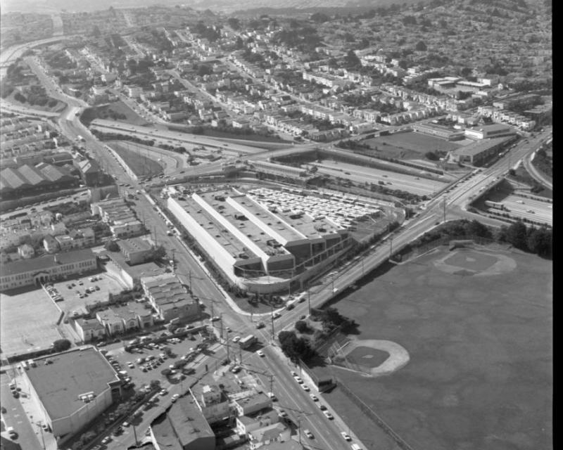 November 1979 aerial shot looking southwest near San Jose and Ocean Avenues shows a newly completed Muni Metro Center and s