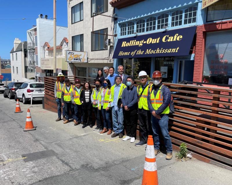 Photo depicting Directors, Supervisor, Staff and Crew outside a cafe on Taraval St on a Shared Space parklet 