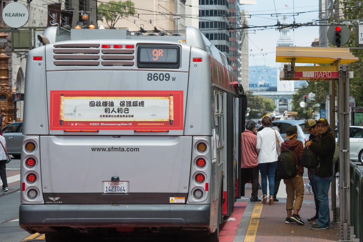 Passengers Unloading From Bus at a Cantilever Stop on Market Street